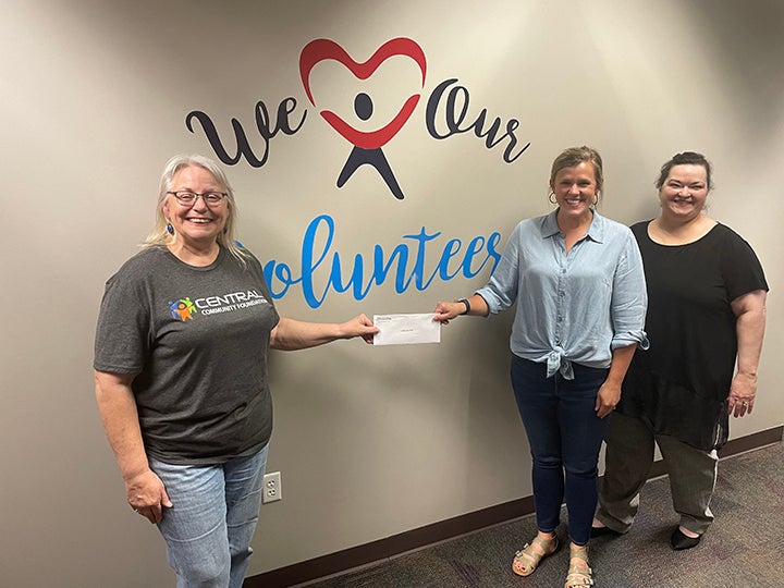 Pictured from left to right are Donna Dollins, Central Community Foundation board member; Morgan McCommas, CASA board president; and Angela Parsons, CASA Executive Director.