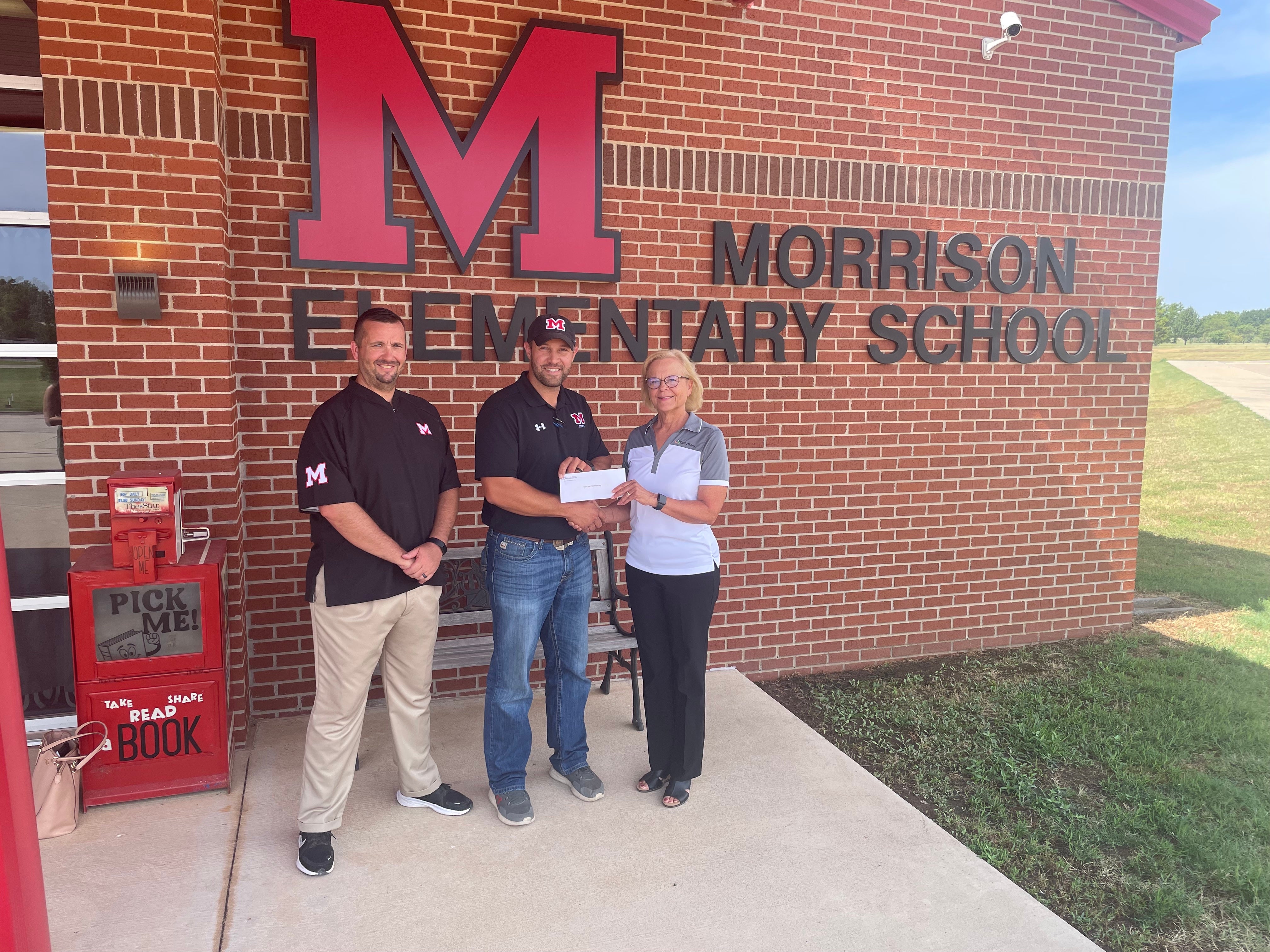 Pictured are Jared Freeman, Assistant Principal; Brent Haken, Superintendent and Carol Dvorak, Central Rural Electric Cooperative trustee.